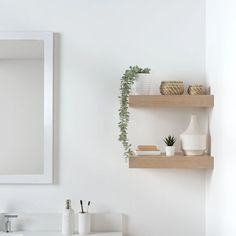 White Oak Floating Shelf White Oak Floating Shelf is designed to match the White Oak series by Teodor Vanities. The floating shelf by Teodor provides ample storage space for all your bathroom essentialsfrom toiletries to towelsFeaturing real wood veneer sure to blend seamlessly with any bathroom decorwhile the fully concealed mounting hardware maintains a sleek modern lookEasy-to-install included mounting hardware makes installation quick and hassle-free. Features: PROUDLY HANDMADE IN CANADA. R Narrow Bathroom Vanities, Oak Floating Shelf, Bathroom Vanity Storage, Green Vanity, Oak Floating Shelves, Blue Vanity, Traditional Vanity, Linen Cabinets, Coastal Bathrooms