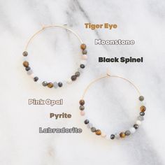 Six ultra-luxe neutral gemstones cover these large gold-filled hoops for a cool wear-with-everything style. Who wouldn't love earrings that take the guesswork out of accessorizing? 45mm (about 1.75") gold-filled hoops with real gemstone beads includes tiger eye, moonstone, black spinel, pink opal, pyrite and labradorite ready for gift giving, packaged on a kraft earring card in a clear resealing sleeve includes earring back for security limited quantities Love Earrings, Earring Card, Gold Filled Hoops, Earring Cards, Black Spinel, Pink Opal, Earring Backs, Tiger Eye, Confetti