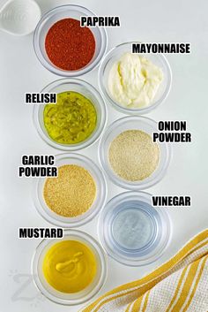 the ingredients to make homemade mayonnaise in small bowls