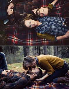 two people are laying on a blanket in the woods and one person is holding his head