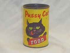 an old tin can with a black cat on it's lid and the words pussyy cat written in red