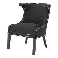 a black and white chair with studding on the armrests, it's upholstered