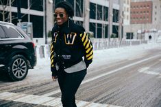 Not Even A Blizzard Could Stop New York Fashion Week Street Style+#refinery29 New York Fashion Week Street Style, Street Style 2017, Autumn Street Style, Fashion Week Street Style, New York Fashion Week, New York Fashion, Varsity Jacket, Fashion Week