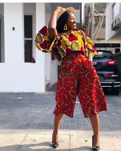 This elegant African print Top with Flared Sleeves & Palazzo  Knee Length Pants is a must-have in your wardrobe. This is a beautiful piece that will have you looking beautiful, classy, and stylish. 🌺 length can be adjusted depending on your height. 🌺 It is easy to wear, comfortable, and very stylish. ❇️ Pls note that the Print used in this sample may not be available but you can always pick other beautiful prints. Please do the following before placing your order; ✅ Write your phone number to make shipping easier ✅ Kindly measure and send in your exact bust, waist and hips  💬 Please send us a message for further details or clarification. Red Printed Festive Sets, Festive Red Printed Set, Traditional Red Printed Sets, Shorts Ankara, African Print Pants, Trendy Ankara Styles, African Print Tops