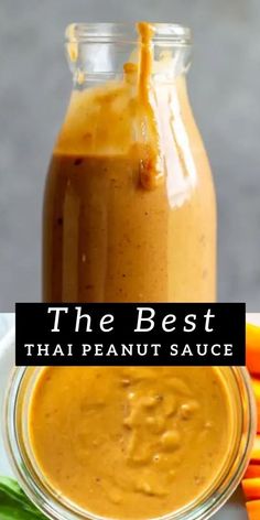 the best thai peanut sauce in a glass jar with carrots and celery