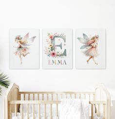 the nursery wall is decorated with three flower prints