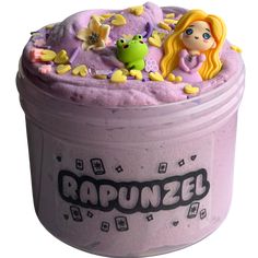 there is a cup with some kind of cake in it that looks like rapunzel