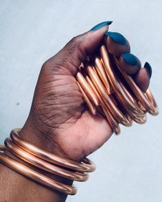 COPPER BANGLES // 100% COPPER // SLIGHTLY ADJUSTABLE // ONE SIZE FITS ALL // 2PC OR 4PC SET Our Modern designed Copper Bangles is one of Vinti Couture's sataple pieces! These Copper Bangles are cut & dessigned by Vinti Couture. Banlges are 100% lightweight, hollow unsealed cooper. Bangles may require seldom cleaning & should be cleaned w/ liquid Brasso (for Copper) to keep bangles polished when needed. **Please see Delivery & Processing Times: Our Pieces are 100% Beautifully Handcrafted by the o Copper Bangles, West Indian Bangles, Copper Choker, Dope Jewelry Accessories, Stackable Bangles, Bangles Set, The Bangles, Bangles Indian, Bangle Bracelet Set