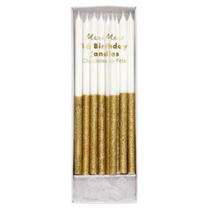 gold glitter candles in a clear box with the words, happy birthday and golden sparkles on