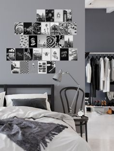 a bed room with a neatly made bed and a wall mounted pictures on the wall