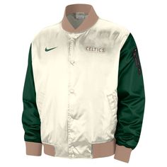 Add a premier piece of Boston Celtics gear to your wardrobe with this Nike 2023/24 City Edition Courtside Bomber Jacket. It features team logos and location-inspired details that highlight what makes their favorite franchise a unique member of the NBA family. The jacket is a light and comfortable way to put your team on your back. With snaps down the front and classic striped ribbing, it is perfect for layering up on cooler Boston Celtics game days. Lightweight jacket suitable for mild temperatu Celtics Game, Nike Mens Clothing, Nba Jacket, Nike Nba, Men Cream, Embroidered Fabric, Boston Celtics, Sports Fan, Lightweight Jacket