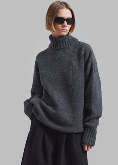 Color: Dark Grey Midweight wool blend fabric Oversized fit Turtleneck Drop shoulders Rib knit trim Small gem embellishment on the back Slip on style Unlined 70% Wool 30% Polyamide Hand Wash or Dry Clean By Sportmax. Imported Grey Swester Dress, Gray Dress Sweater, Dark Grey Cable Knit Sweater, Grey Turtleneck Outfit, Dark Grey Sweater, Knitted Sweater Dress, Turtleneck Outfit, Street Style Fall Outfits, Wool Sweaters Womens