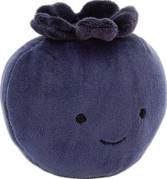 a blue stuffed animal with a bow on its head