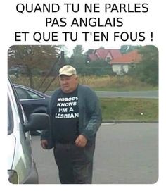 an older man is standing in front of a car and has his hand on the door handle