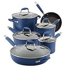 blue pots and pans stacked on top of each other