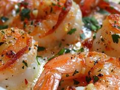 closeup of cooked shrimp with parsley on top