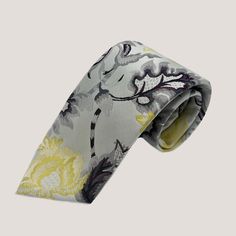 Indulge in the charm of nature with our 100% Silk Tie & Pocket Square for Men, featuring intricate floral patterns of flowers and leaves. Crafted with meticulous attention to detail, this tie adds a touch of sophisticated elegance to any outfit, making it perfect for both formal occasions and everyday wear.     100% Silk ﻿    61" length    3" wide    Hand Crafted  Dry Clean Only Bow Tie Pants, Crystal Dress, Outfit Making, Black Shirt Dress, Tie Knots, Navy Pink, Tie And Pocket Square, Flowers And Leaves, Floral Patterns