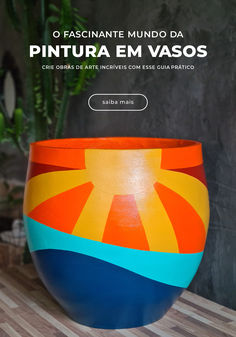 a colorful vase sitting on top of a wooden table