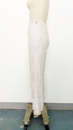 Mod 1960s handmade lace pant set - Skinny strap white lace tunic with sweetheart neckline and scalloped hem. Metal zipper on the back with hook-and-eye closure at top. Fully lined with blush fabric and nude overlay. - Cropped straight leg high-rise white lace pants with scalloped hem. Side metal zipper and hook-and-eye closure on tab. Fully lined in blush fabric with nude overlay. Label: Fashioned by Ruth Steele Elegant Lace Bottoms With Lace Trim, Feminine Lace Trim Bottoms For Wedding, Feminine Wedding Bottoms With Lace Trim, Feminine White Lace Bottoms, Fitted White Pants With Lace Trim, Chic Fitted Bottoms With Delicate Lace, Elegant Beige Bottoms With Lace Trim, Fitted White Bottoms With Lace Patchwork, White Delicate Lace Bottoms For Party