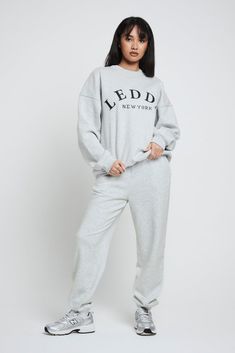 The LEDDA Oversized Varsity Sweatshirt is an ideal addition to any loungewear rotation. 420GSM organic brushback cotton polyester blend gives a soft-touch, cozy feel, with premium neckline, cuff and hem ribs providing a boxy, oversized fit. Embroidered LEDDA branding on the front chest allows you to wear this piece with pride. This product has an oversized fit as standard. Size down if you prefer a closer fit. Cozy Oversized Sweatshirt For Lounging, Oversized Crew Neck Sweats For Lounging, Oversized Athleisure Sweatshirt For Lounge, Trendy Relaxed Fit Sweatshirt For Loungewear, Oversized Sweatshirt With Ribbed Cuffs For Lounging, Oversized Athleisure Sweatshirt For Lounging, Cotton Sweatshirt With Elastic Cuffs For Loungewear, Comfy Relaxed Fit Sweatshirt For Lounging, Comfortable Cotton Sweatshirt For Lounging