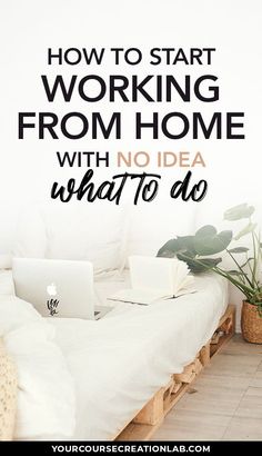 a bed with a laptop on top of it next to a plant and potted plants