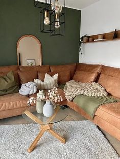 a living room filled with furniture and decor