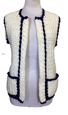 Hand made crochet vest. Two front pockets, open front styling. Approximate measurements: Chest 38", length 25" from top of shoulder. Customer satisfaction is our #1 goal. We are committed to offering our valued customers 100% authentic, brand name products at discount prices. All our items are purchased directly from department stores and are usually over-stocked or out of season items. We guarantee their quality and authenticity. We try to take the best pictures to represent each items authenticity as well as descriptions and brand names of each item if possible, to give you as much information as possible before making a purchase. If for any reason you're not satisfied, please contact me BEFORE leaving feedback. I will work with you to make sure you are happy and satisfied "WENDY WAS HER Casual White Crochet Vest, White Sleeveless Winter Cardigan, White Crochet Vest For Spring, Fitted White Crochet Outerwear, White Crochet Cotton Outerwear, White Cotton Crochet Outerwear, Crochet Open Vest, Groovy Crochet, Department Stores