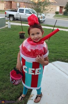 a child in a costume that looks like a cupcake