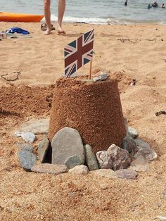 a sand castle made to look like the british flag