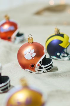 Show your Clemson Tigers pride with this helmet ornament. A must-have for any fan, it adds collegiate spirit to your Christmas tree. Clemson Tigers Football, Themed Christmas Tree, Tiger Football, Gifts For Football Fans, Football Helmet, Clemson Tigers, Altar'd State, Football Fans, Ornament Gifts