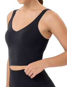 PRICES MAY VARY. Craft from a blend of buttery soft, moisture-wicking and stretchy fabric that allows for unrestricted movement and comfory wear Built-in bra for added support and convenience to adjustment Tigh fit count your body for slim look Cropped length accentuates your waist, creat a chic look that pairs well with high waist pants Design for low impact workout. Suitable for yoga, Pilates, fitness, or daily wear Our Longline Padded Sports Bras, meticulously designed for low-impact workouts Yoga Bra Tops, Pilates Fitness, Athletic Workout, Golf Skirts, Padded Sports Bra, Athlete Workout, Workout Yoga, Low Impact Workout, Yoga Bra