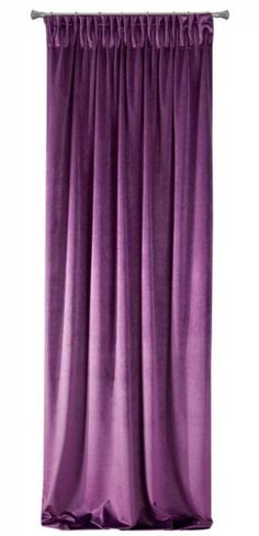 a purple curtain hanging on the side of a wall