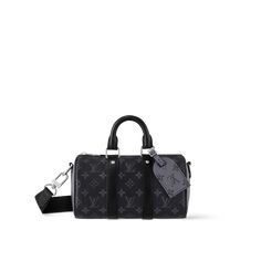 LOUIS VUITTON® - Keepall Bandoulière 25 - Monogram Eclipse Reverse Luxury Gifts For Men, Spring Sandals, Louis Vuitton Keepall, Louis Vuitton Official, Wallet Pouch, Monogram Bag, Messenger Bag Men, City Bag, Best Gifts For Men