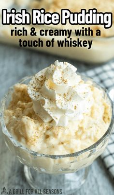 irish rice pudding in a small glass dish with whipped cream on top and the words rich & creamy with a touch of whiskey