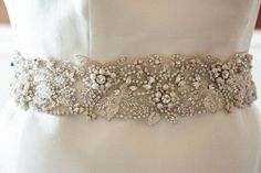 Beaded wedding dress belt Flora 27 to 28 Inches Made to Elegant Bedazzled Silver Bridal Accessories, Elegant Silver Bedazzled Bridal Accessories, Elegant Embellished Bridal Accessories For Ceremony, Elegant Pearl Embroidered Bridal Accessories, Elegant Bridal Accessories With Pearl Embroidery, Elegant Bedazzled Bridal Belt For Wedding, Elegant Embellished White Bridal Belt, Elegant Bedazzled Wedding Sash, Elegant Rhinestone Bridal Accessories For Wedding