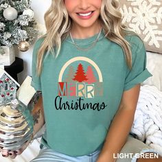 Merry Christmas Shirt, Merry Christmas Tee, Family Christmas Shirt, Comfort Colors Christmas Shirt, Holiday Shirt, ❤Comfort Colors brand t-shirt or Rabbit Skins Bodysuit ❤Style number Comfort Colors 1717, 9018, 6014, or Rabbit Skins Bodysuit 4424 ❤Unisex Adult Sizing. Relaxed Fit ❤100% ring spun cotton, garment-dyed ❤7/8" double-needle top-stitched collar ❤Twill taped neck and shoulders for extra durability ❤Double-needle armhole, sleeve and bottom hems ❤Signature twill label ❤We use high quality vinyl material with industrial size printer to print the designs. Then we heat transfer our design onto our shirts. CARE ❤ Wash inside out with like colors ❤ Machine wash cold. Tumble dry: medium heat; Do not iron; Do not dry-clean. SIZING ❤ Please reference the sizing chart listed in the photos b Bodysuit Style, Merry Christmas Shirts, Bodysuit Fashion, Holiday Shirt, Family Christmas Shirts, Christmas Tees, Holiday Shirts, Christmas Shirt, Christmas Colors