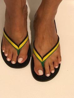 Jamaica Flip Flop Beach Slippers With Rubber Sole And Single Toe Strap, Green Single Toe Strap Flip Flops For Beach, Green Leather Flip Flops With Round Toe, Casual Yellow Toe Post Flip Flops, Handmade Leather Casual Flip Flops, Casual Beach Slippers With Toe Loop, Casual Handmade Leather Flip Flops, Multicolor Toe Post Flip Flops For Vacation, Handmade Casual Flip Flops For Summer