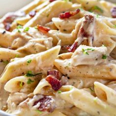 a bowl filled with pasta and chicken salad