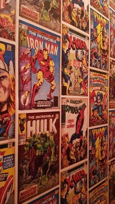 a wall covered in comic books and comics