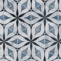 an artistic tile design in blue and white