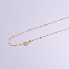 If you receive a defective item, please contact us within 5 days of arrival. Item Details - Material: Brass, 14K gold plated Clasp: Spring ring Chain Style: Curb with satellite beads Length: 17.5 Inches Width: 0.8 mm Bead Size: 2.0 mm Please avoid any water or chemical solutions. Keep the chain in a dry environment. Curb Chain Necklace, Cz Stud Earrings, Layering Necklace, Keep Jewelry, Minimalist Necklace, Chain Ring, Gold Plated Chains, Curb Chain, Diy Earrings