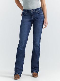 RIDING JEANS THAT NEVER QUIT Feel confident and comfortable in your riding clothes by giving yourself the best seat possible. Wrangler® women's Ultimate Riding Jeans are designed for fit, form, and function while on horseback, but they are bound to become your go-to jeans for working in the barn and running errands around town. Q-Baby women's jeans feature a mid-rise fit and no-gap waistband for full coverage when you're in the saddle as well as added stretch and flat seams for all-day comfort. Preppy Fits, Riding Jeans, Riding Clothes, Never Quit, Baby Jeans, Womens Jeans Bootcut, On Horseback, Riding Outfit, Wrangler Jeans