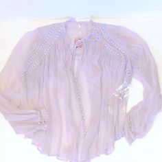 Nwt Free People Lilac Lace & Chiffon Blouse Sheer With Button Cuffs Beautiful Romantic, Slightly Cropped Silhouette. Lots Of Flow And Movement - Generous Sizing - Would Fit Up To A Standard Medium Long Sleeve Chiffon Blouse For Daywear, Spring Purple Chiffon Top, Chiffon Tops For Daywear, Elegant Purple Chiffon Blouse, Feminine Chiffon Blouse For Daywear, Chiffon Blouse With Lace Trim For Spring, Feminine Sheer Blouse For Daywear, Spring Chiffon Button-up Blouse, Spring Chiffon Button-up Tops