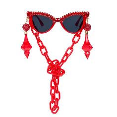 Dramatic, eye catching, and ultra fabulous, these sunnies are truly a MUST HAVE accessory! With marquis shaped rhinestones above lenses and cat eye frames in a dramatic red hue, these sunnies are the perfect accessory your next fabulous going out outfit! As if these sunnies could be any more amazing, the stems have removable hanging crystal tassels at the temple that with eye-catching metallic beads. The not-so-subtle chunky red removable neck chain can easily transition into a fabulous mask cha Star Sunglasses, Going Out Outfit, Hanging Crystal, Eye Spy, Mask Chain, Red Sparkle, June Birthstone Jewelry, Eye Frames, Neck Chain