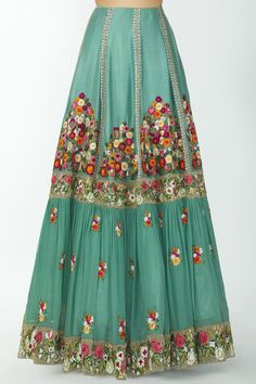 Teal peplum-style short kurta with all-over floral motif bead and thread work. Comes with embellished lehenga and lace trim border dupatta.
Components:3
Embroidered
Neckline:V Neck
Sleeve Length:Half
Fabric:Pure Georgette
Color:Blue, Green
Peplum kurta
Scallop sleeve hem
Gathered detail
Deep u-back
Dupatta with lace trim border - Aza Fashions Traditional Lehenga With Intricate Embroidery For Spring, Traditional Green Lehenga For Spring, Spring Green Embroidered Lehenga, Spring Festival Embroidered Green Lehenga, Spring Embroidered Green Lehenga, Bohemian Green Lehenga With Floral Embroidery, Spring Anarkali Lehenga With Chikankari Embroidery, Traditional Spring Sharara With Dori Work, Spring Festive Lehenga With Chikankari Embroidery