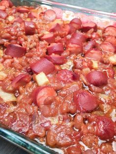 a casserole dish with potatoes and meat in it