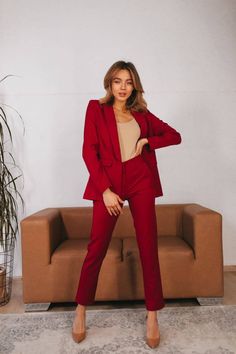 2-piece Womens Blazer Trouser Suit for office, business meetings, formal events and special occasions. Also perfectly combines with sneakers so after a long and tiring business day you can change you heels to sneakers and still look chic. DETAILS - slim fit pants - cropped - high rise - blazer is buttoned - lined - front pockets - slim fit MATERIAL Premium quality suiting fabric SIZES The models in photos are wearing a size S Available in 4 sizes: XS= 0-4 US numeric BUST 32-34 inches or 82-86 cm Raspberry Blazer Outfit, Office Lady Suit With Notch Lapel For Business Meetings, Notch Lapel Suits For Business Meetings, Office Lady Notch Lapel Pantsuit For Business Meetings, Office Lady Pantsuit With Notch Lapel For Business Meetings, Professional Sets With Notch Lapel For Business Meetings, Professional Solid Suits For Business Meetings, Elegant Solid Business Suits, Red Office Suits