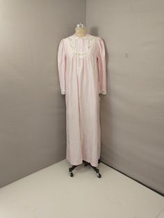 "Old fashioned style nightgown with lace, satin, and embroidered detail. Classic, modest, and full comfortable shape. Lightweight flannel interior and satin exterior, fabric tag reads polyester nylon blend Fabric is soft and lightweight. Excellent condition, no stains. Deadstock, never worn. Label is Barbizon, size marked M, shown on an 8 dress form - please go by measurements.  Length 55\" Shoulders 15\" Pit to pit 21\" Bust 48\"  Waist 54\" Hips 56\"   Hem circumference 61\" wt 10oz" Fitted Lace Trim Nightgown For Sleepover, Lace Trim Nightgown For Sleepover, Cotton Lace Trim Sleepwear For Wedding Night, Vintage Fitted Sleepwear For Sleepover, Fitted Lace Nightgown For Sleepover, Fitted Vintage Sleepwear For Sleepover, Lace Long Sleeve Sleepwear, Fitted Cotton Sleepwear With Lace Trim, Fitted Lace Trim Sleepwear For Sleepover