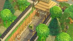 an aerial view of a train station in the game animal crossing, which is surrounded by trees and bushes