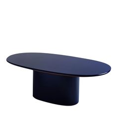 an oval table with a black top on a white background